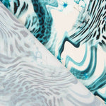 Crêpe Hellblau mit Tiermuster und Blumendruck - Ribes y Casals