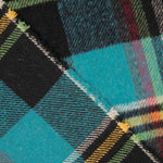 Mufflon Retal Türkis, Schwarz und Senf kariert 60 x 150 cm - Ribes y Casals