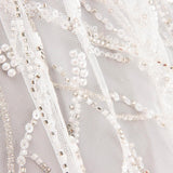Brautkleid aus weißem Tüll mit Strass und Zweigen im Farbverlauf – Elegance - Ribes y Casals