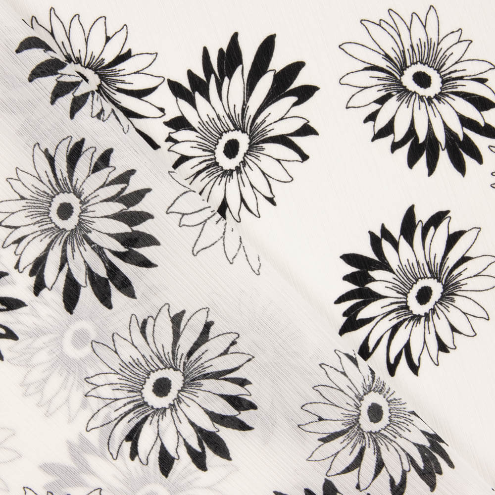 Bambula-Gaze mit Gänseblümchen, schwarz-weiß - Ribes y Casals