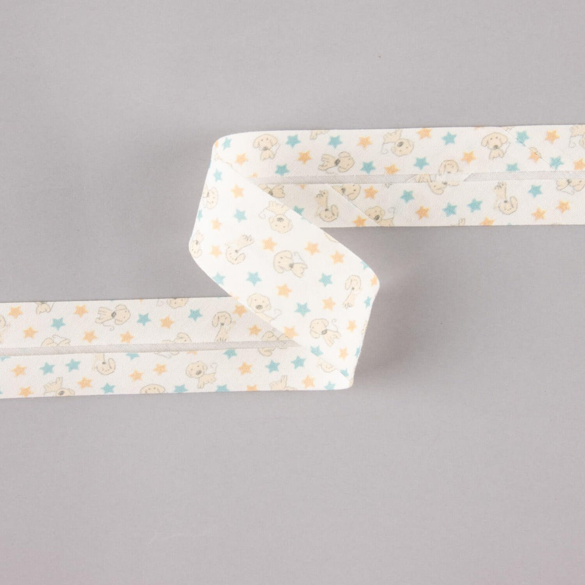 Bias Tape Doggy Stars Blau-Orange 18 mm - Ribes y Casals