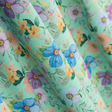 Popeline-Reststück mit Flamenco-Blumenmuster in Hawa-Grün – verschiedene Maße x Breite 140 cm - Ribes y Casals
