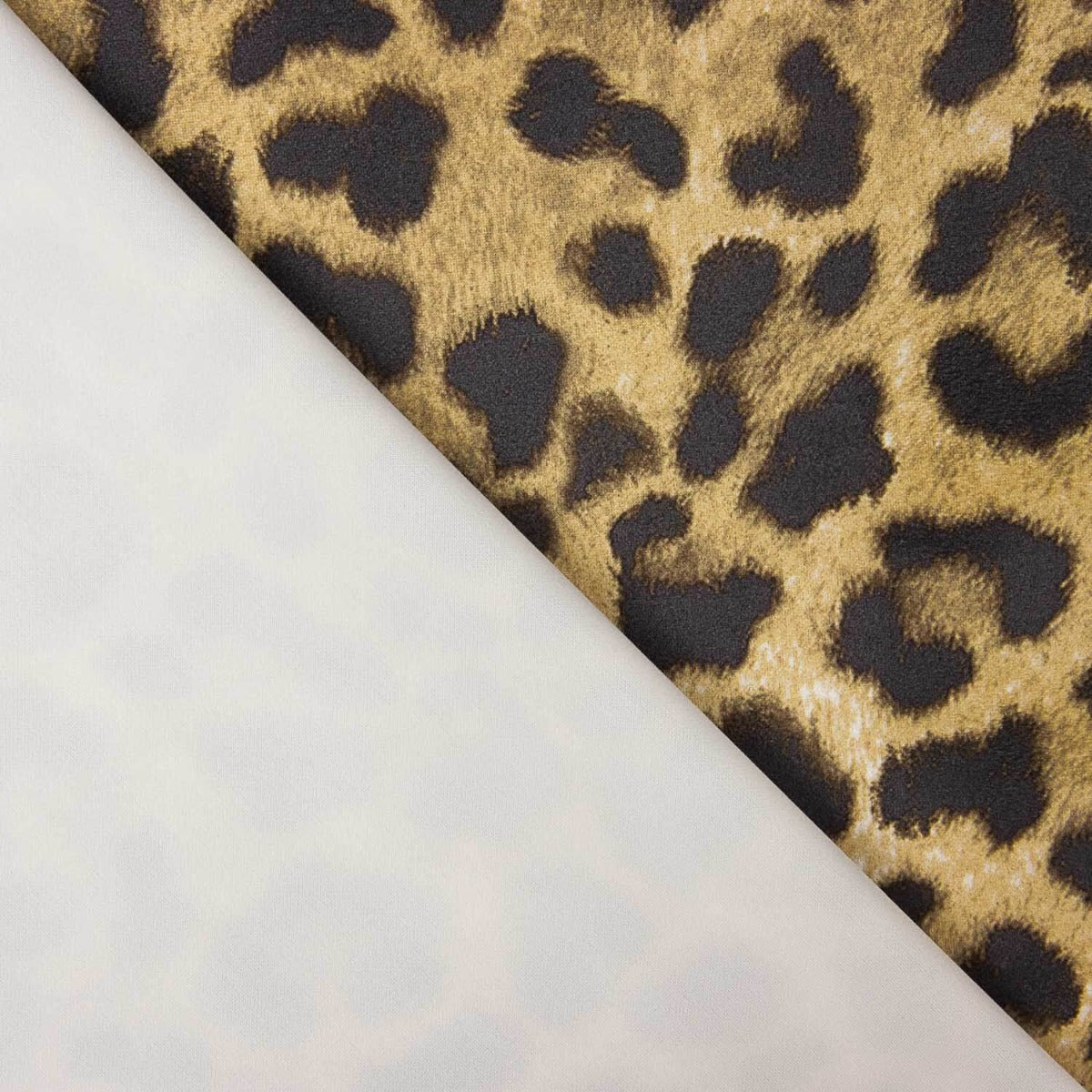 Neopren-Strickstoff-Reststück Leopard Stretch – verschiedene Maße x Breite 150 cm - Ribes y Casals