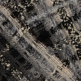 Grau-schwarzer Mosaik-Tweed aus Wolle mit Gold-Lurex - Ribes y Casals