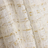 Lumière-Tweed aus Wolle in Elfenbein mit Gold-Lurex - Ribes y Casals
