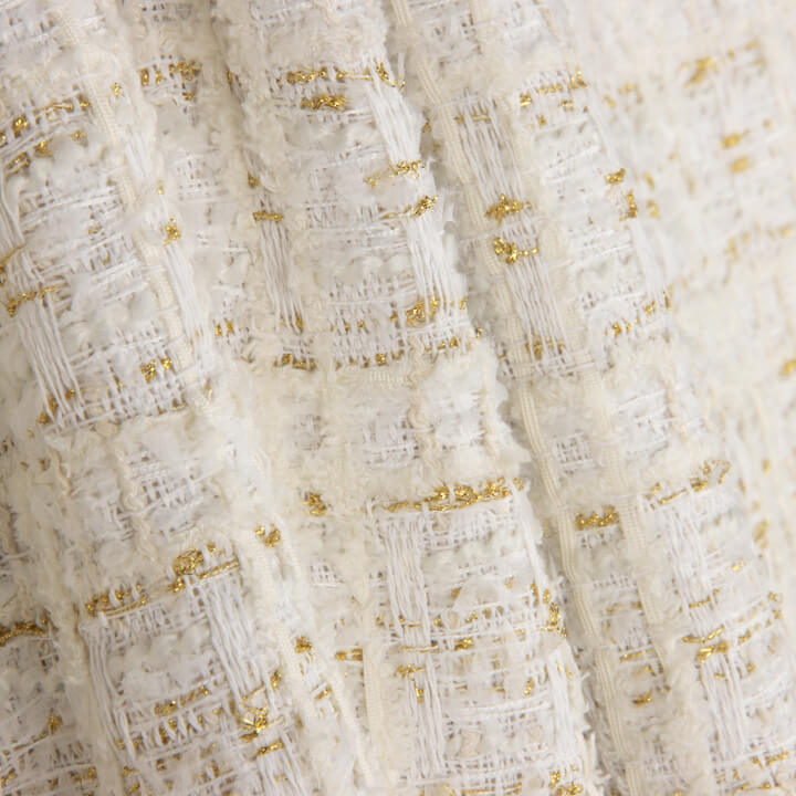 Lumière-Tweed aus Wolle in Elfenbein mit Gold-Lurex - Ribes y Casals