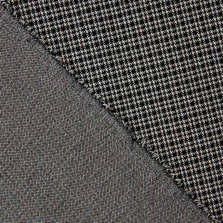 Jacquardstrick mit Hahnentritt-Muster und schwarz-weißen Karos - Ribes y Casals