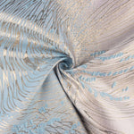 Jacquard-Muster „Vortice“ in Himmelblau und Elfenbein - Ribes y Casals