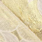 Jacquard-Muster „Blütenblätter“ in Elfenbein und Gold - Ribes y Casals