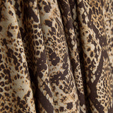 Beidseitig bedruckter Viskosestoff mit braunem Schlangenmuster-Animalprint - Ribes y Casals