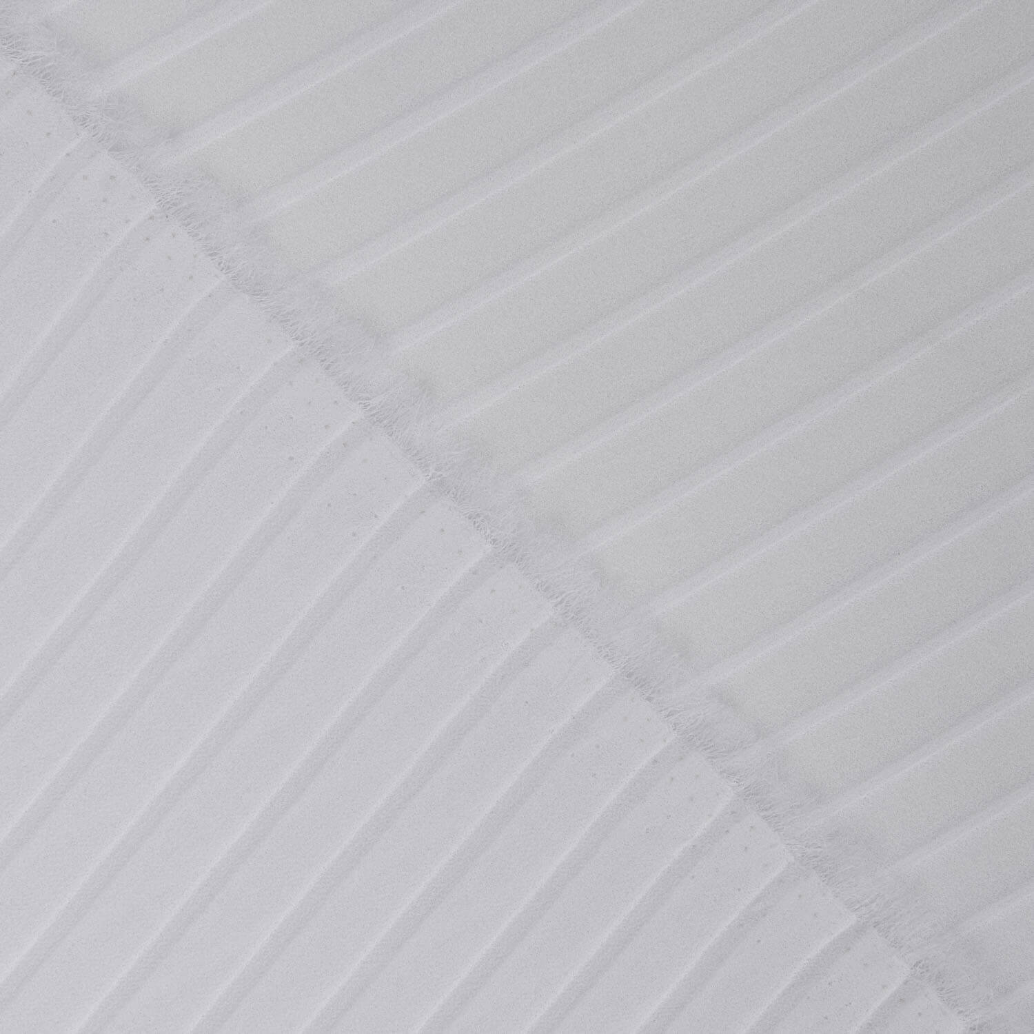 White, plissed Gaze „Soleil“ - Ribes y Casals