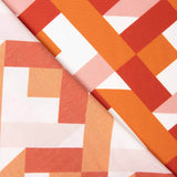 Viskose mit geometrischem Muster in Orange und Koralle - Ribes y Casals