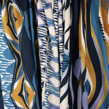 Viskose mit geometrischem Muster in Blau und Senfgelb - Ribes y Casals