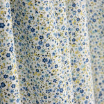 Reststück Popeline aus Bio-Baumwolle mit „Tausend blaue Blumen“-Muster – verschiedene Maße x Breite 145 cm - Ribes y Casals