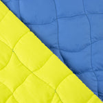 Reversible Steppdecke in Blau und Limone - Ribes y Casals