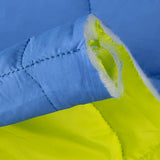 Reversible Steppdecke in Blau und Limone - Ribes y Casals