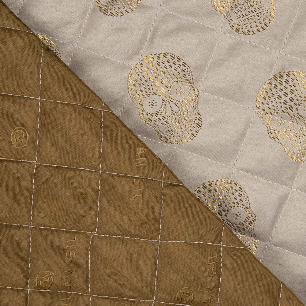 Gesteppte Jacquard-Steppdecke Totenköpfe Gold - Ribes y Casals