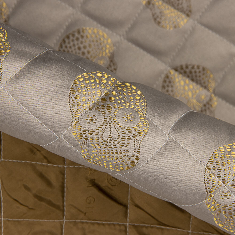 Gesteppte Jacquard-Steppdecke Totenköpfe Gold - Ribes y Casals
