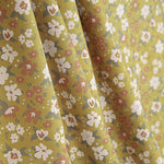 Perkal mit bedrucktem Blumenmuster in Senfgelb - Ribes y Casals