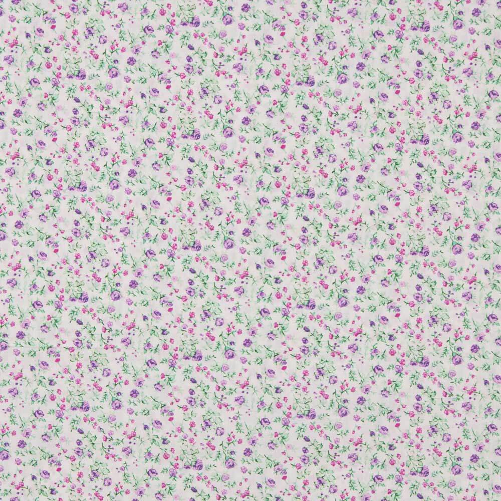 Lila-blaue Baumwollpopeline mit Blumen - Ribes y Casals