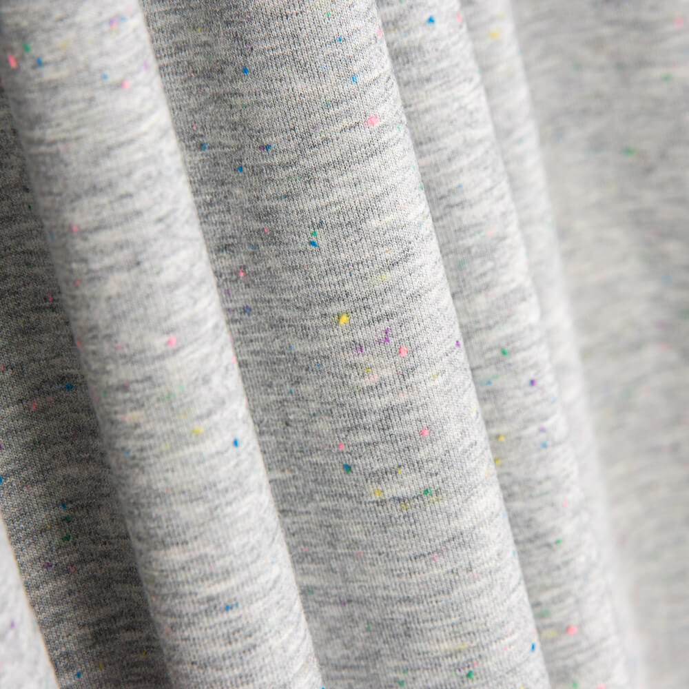 Dunkelgraues Fleece mit gestrickten Tupfen - Ribes y Casals