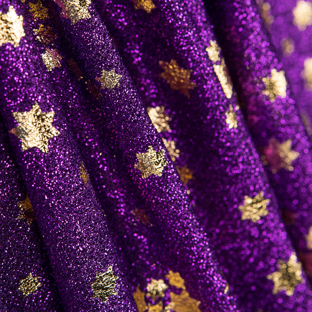 Lila Lamé gestrickte Sterne - Ribes y Casals