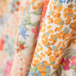 Twill Elastan Koralle Blumen - Ribes y Casals
