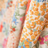 Twill Elastan Koralle Blumen - Ribes y Casals