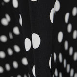 Schwarzer Polka Dot Stretch Twill - Ribes y Casals