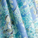 Hellblauer Satin mit Blumendruck - Ribes y Casals