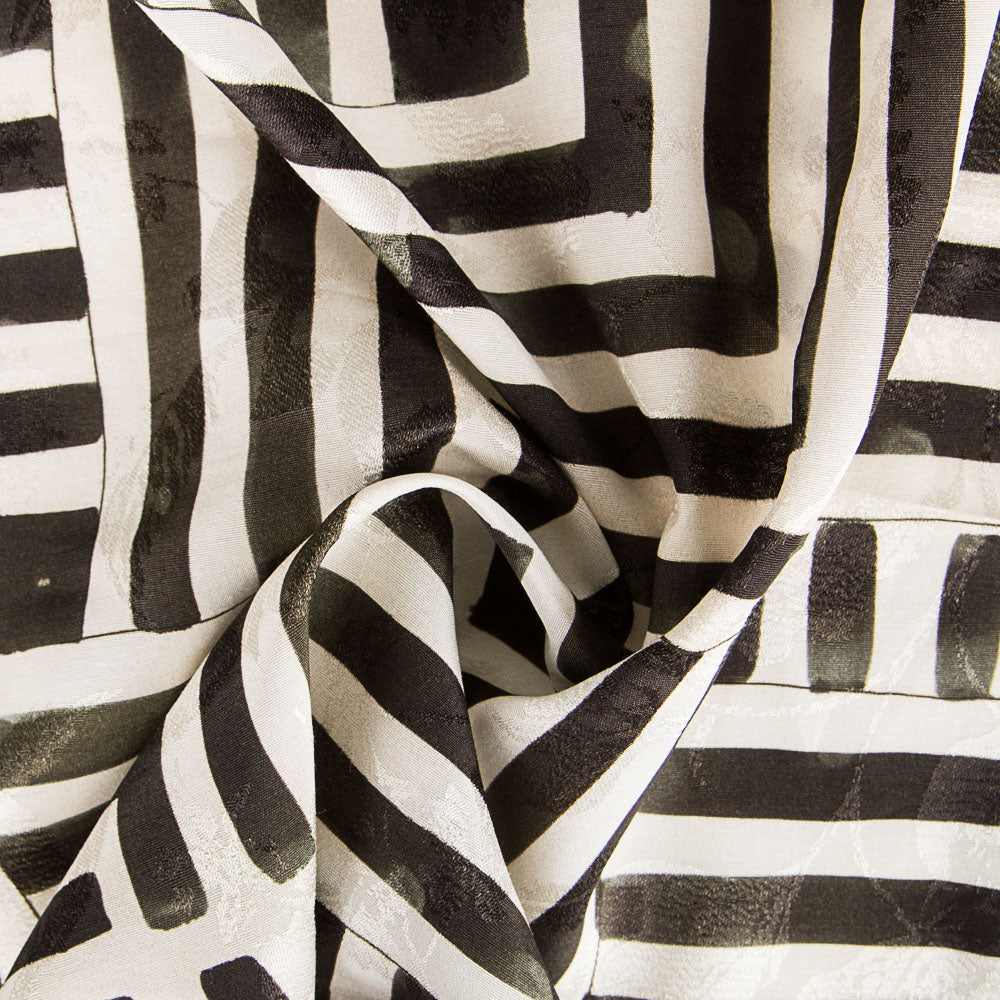 Geometrischer schwarzer Jacquard-Satin - Ribes y Casals