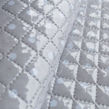 Gesteppter, plastifizierter Steppstoff mit grauen Polka Dots - Ribes y Casals