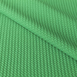 Geometrischer grüner Jacquard-Strickstoff - Ribes y Casals