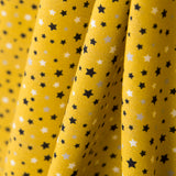 Multi-Star Cotton Ochre Hintergrund - Ribes y Casals