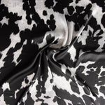 Schwarz gesprenkelter, gemusterter Satin - Ribes y Casals